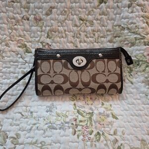 Coach Penelope Signature Zippy Turnlock Wristlet Brown Silver Hardware